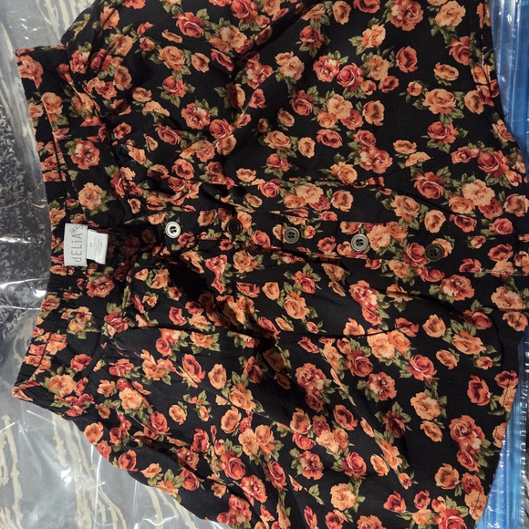 dELiA*s Dresses & Skirts - dELiA*s Black Skirt with Orange and Red Floral Pattern